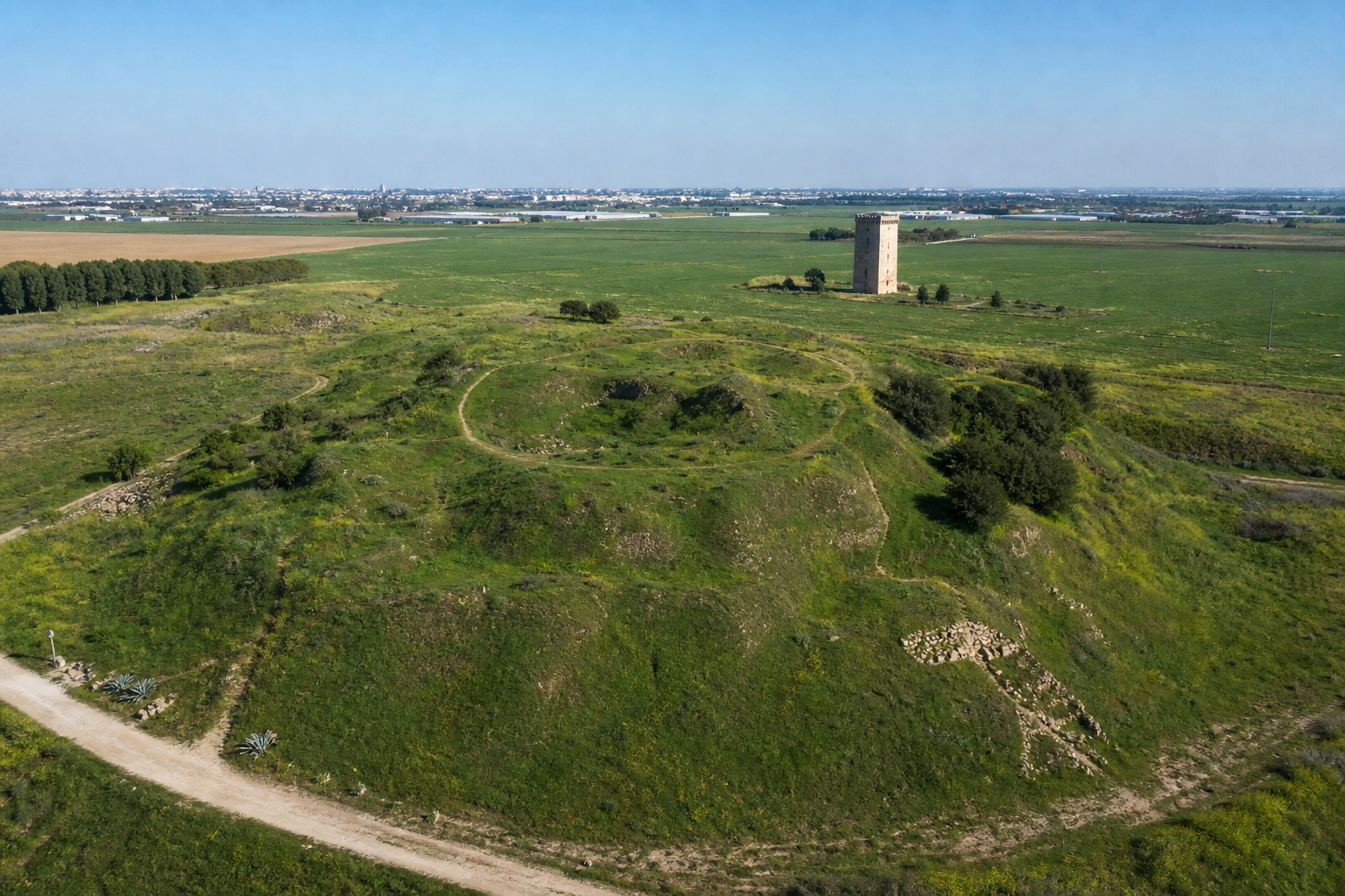 Tel Yavne archaeological mound in Yavne Israel The 450 by 350 meter mound at Tel Yavne offers visitors a compact walk through layered history.