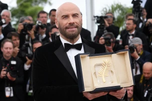 John Travolta Receives Honorary Palme d'Or at Cannes